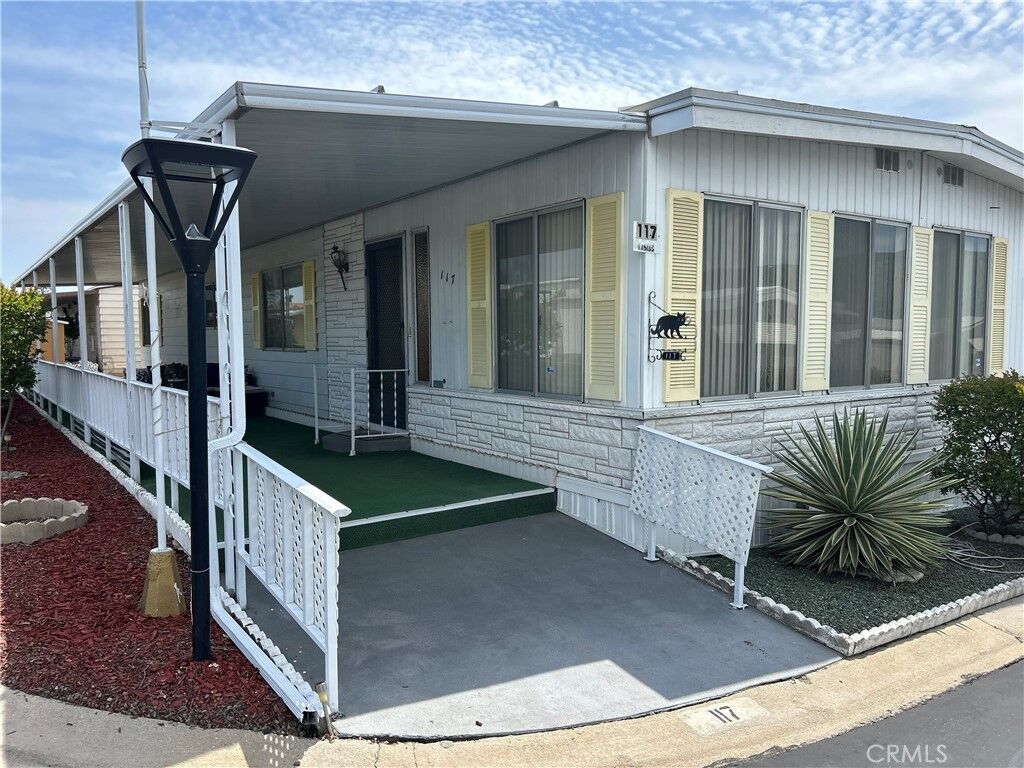 Property Photo: 35218 Fir Street 117 CA 92399