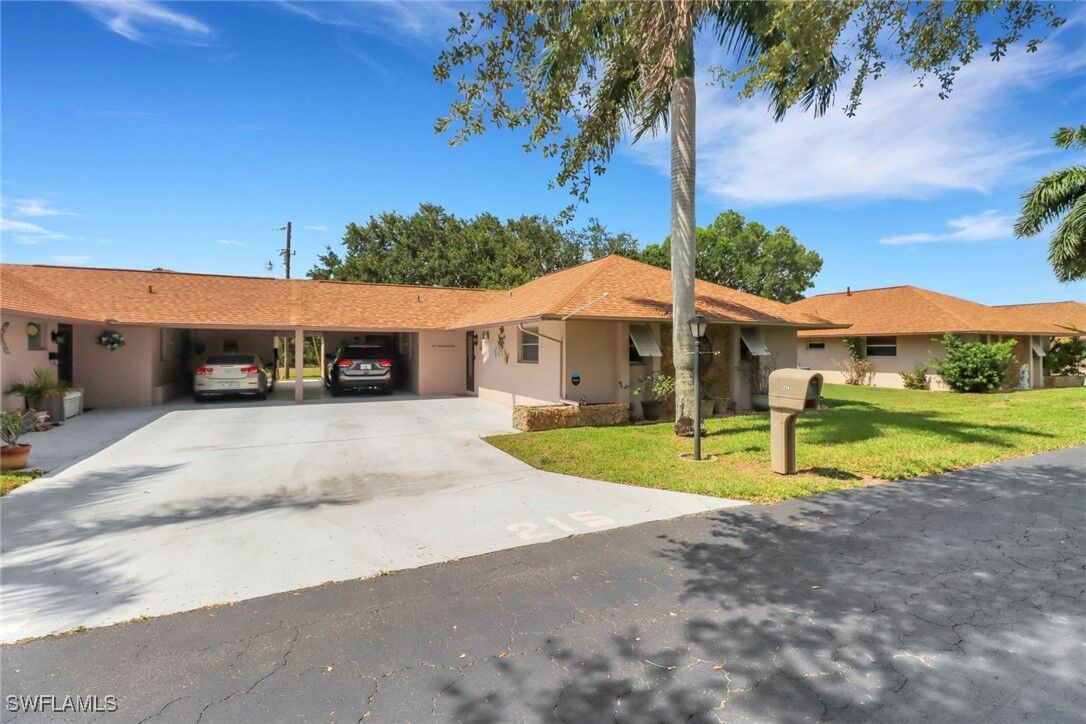 Property Photo: 215 Oaklawn Court FL 33936