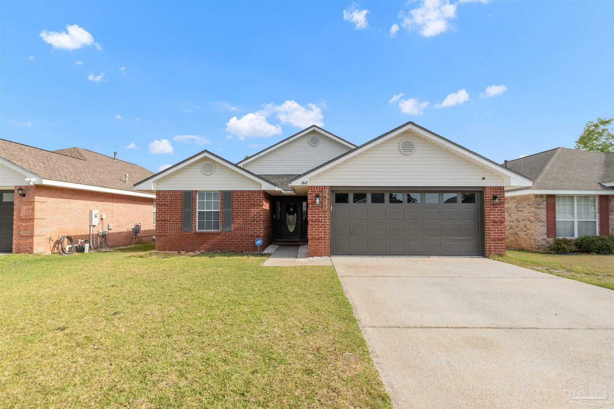 Property Photo: 1617 Sutton Place Dr FL 32547