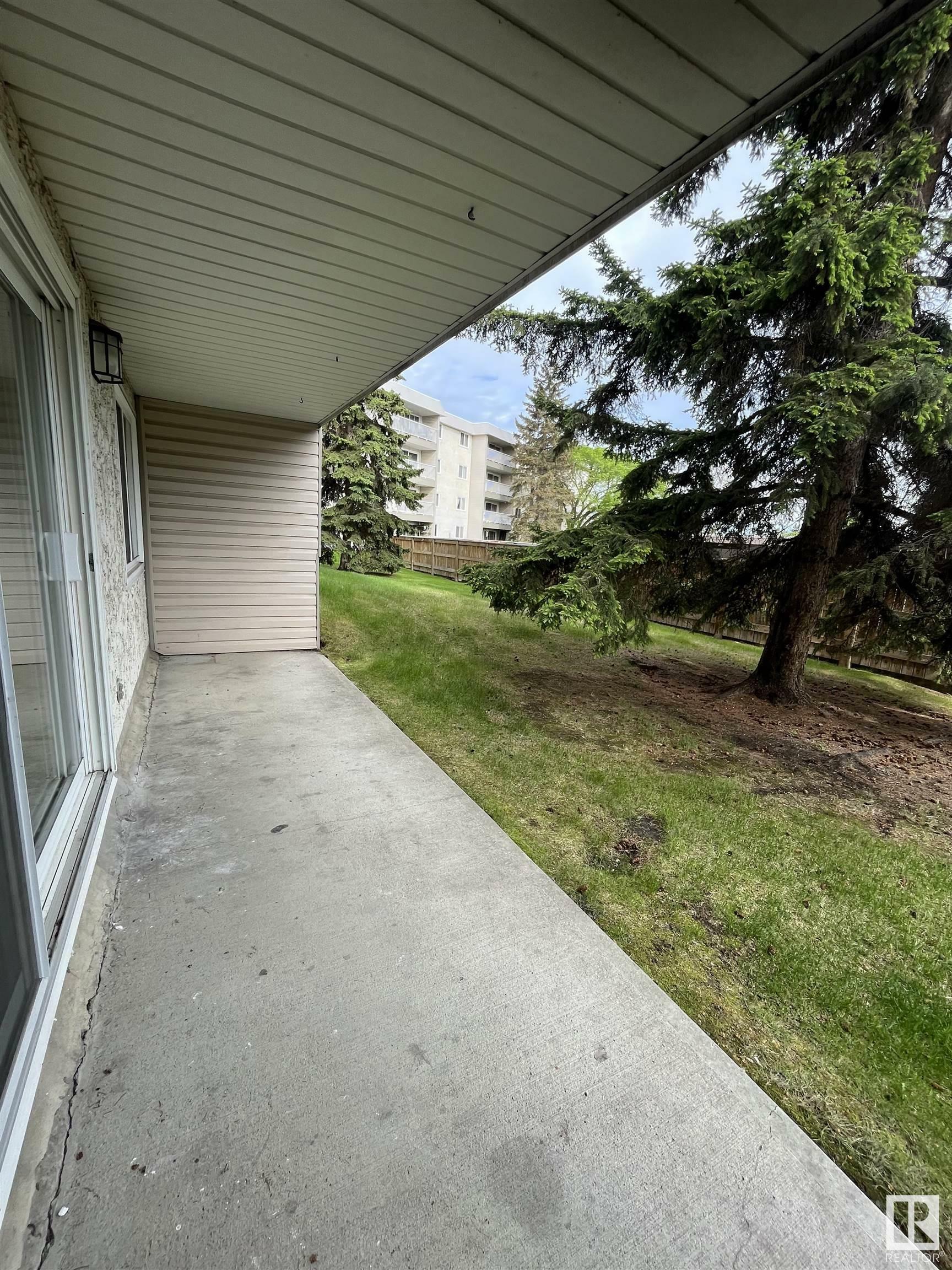 Property Photo: 5125 Riverbend Road NW 113 AB T6H 5K5