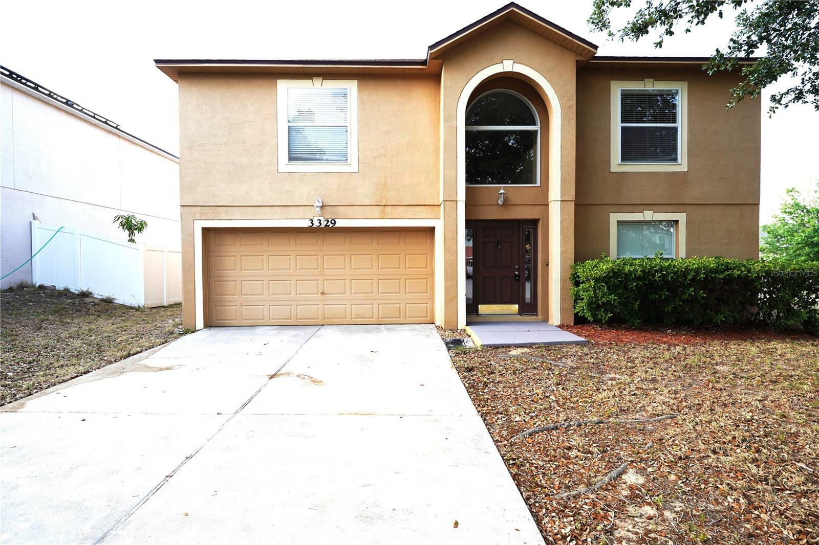 Property Photo: 3329 White Blossom Lane FL 34711