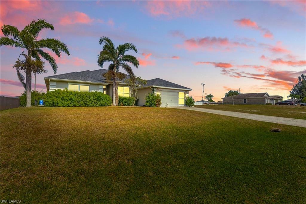 Property Photo: 1409 NW Juanita Pl FL 33993