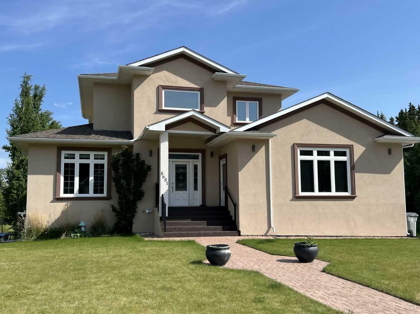 Property Photo:  5651 16 Ave  AB T7E 1X1 