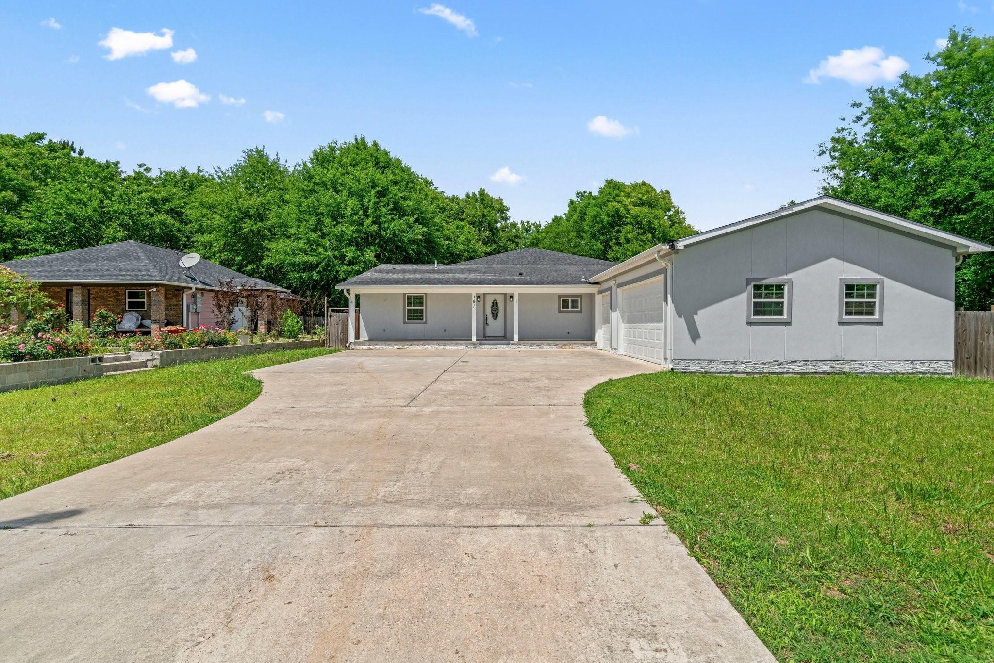 Property Photo: 381 County Road 3404 TX 77327