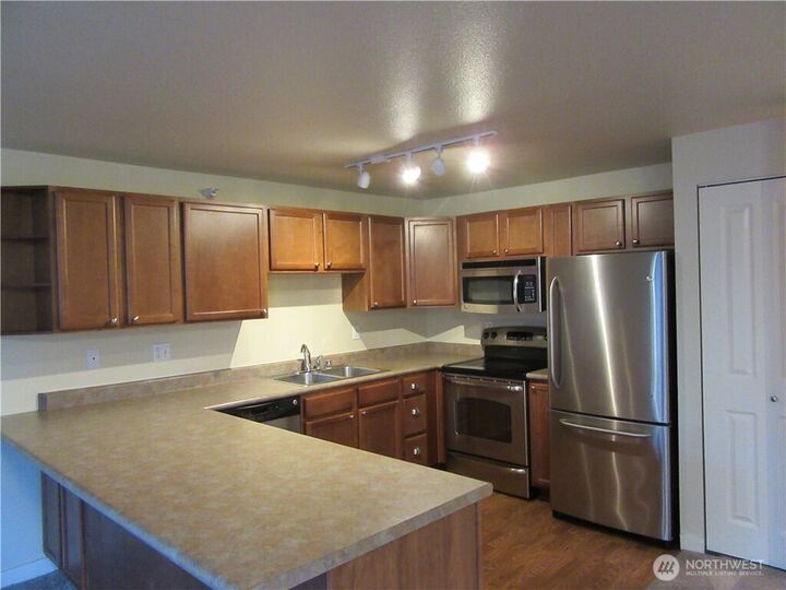 Property Photo:  700  Front Street S B104  WA 98027 