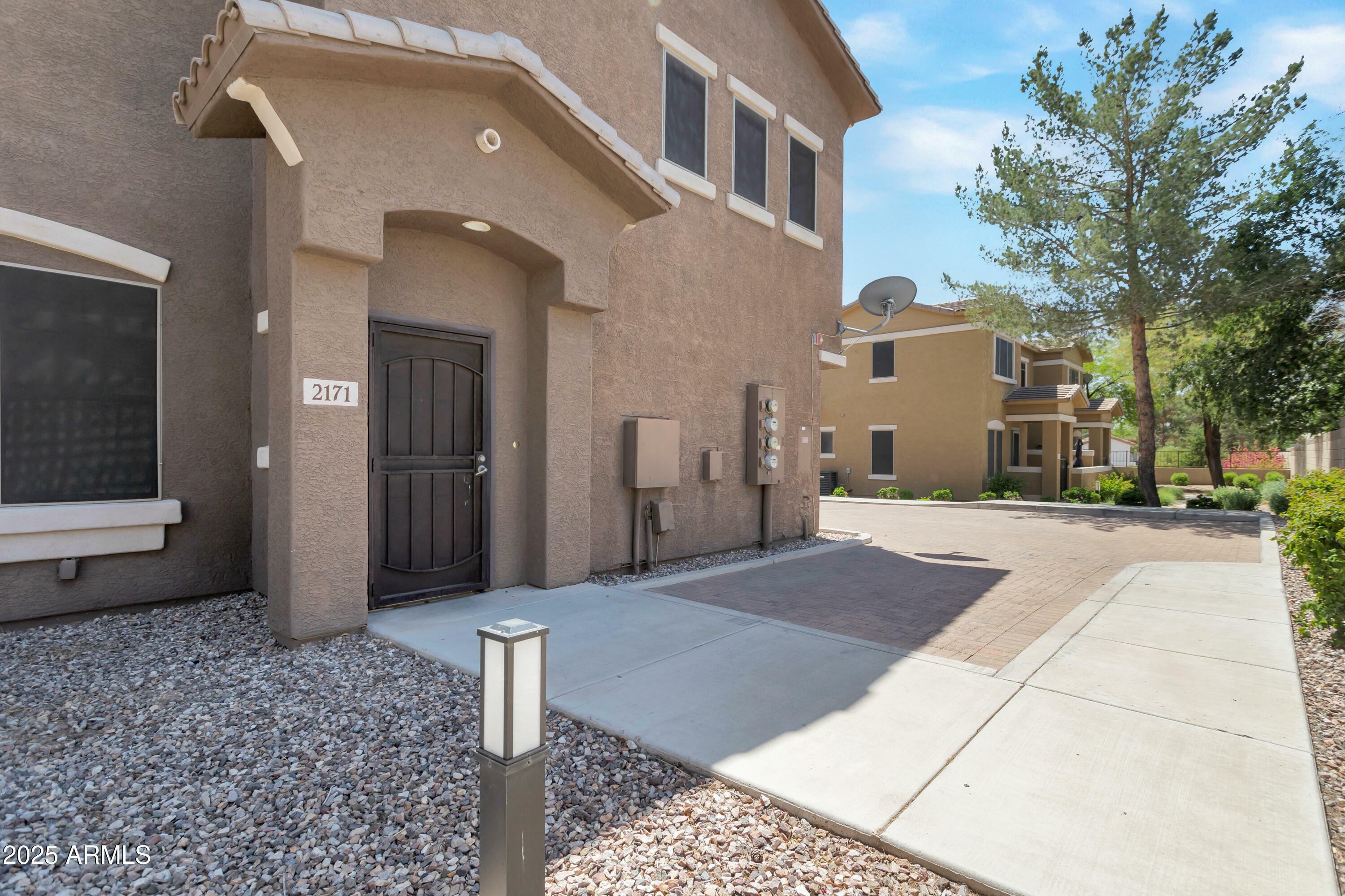 Property Photo: 15240 N 142nd Avenue 2171 AZ 85379