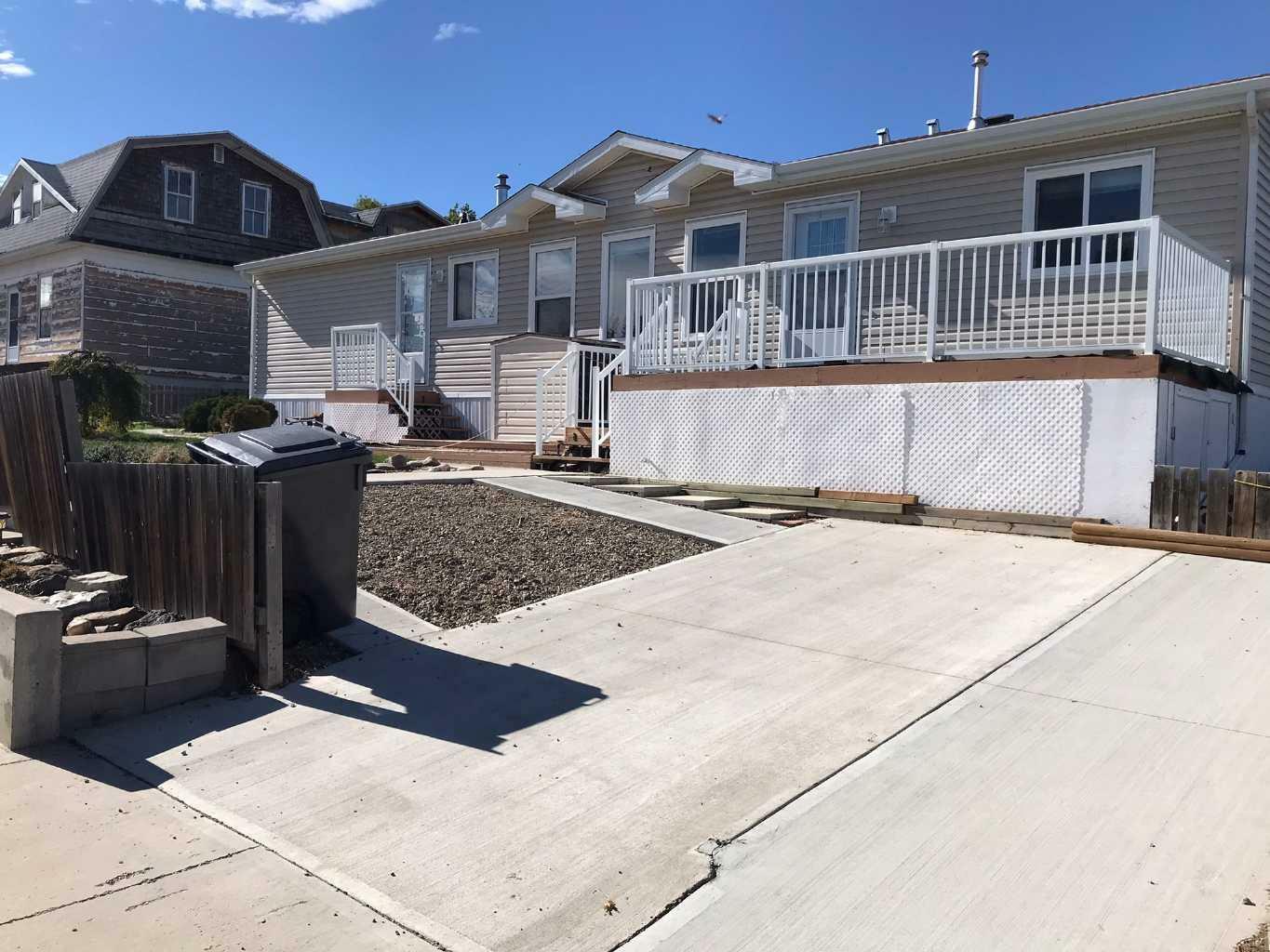 Property Photo: 208 2A Street W AB T0K 0N0