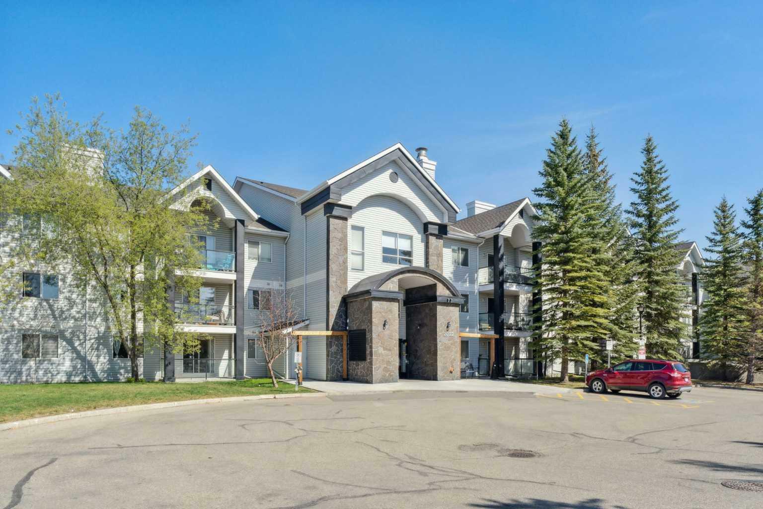 Property Photo: 2022 Canyon Meadows Drive SE 111 AB T2J 7H1