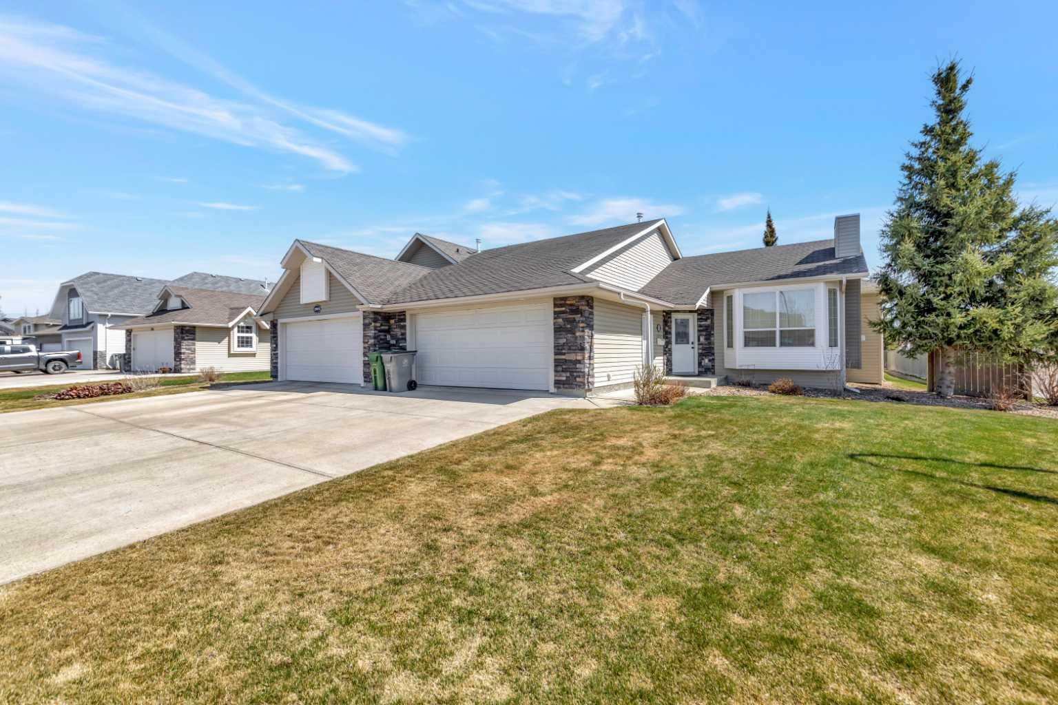 Property Photo: 1901 52B Avenue Close AB T9V 2H1