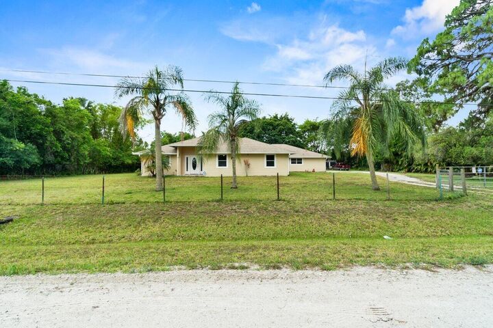 Property Photo: 13698 63rd Lane N FL 33412
