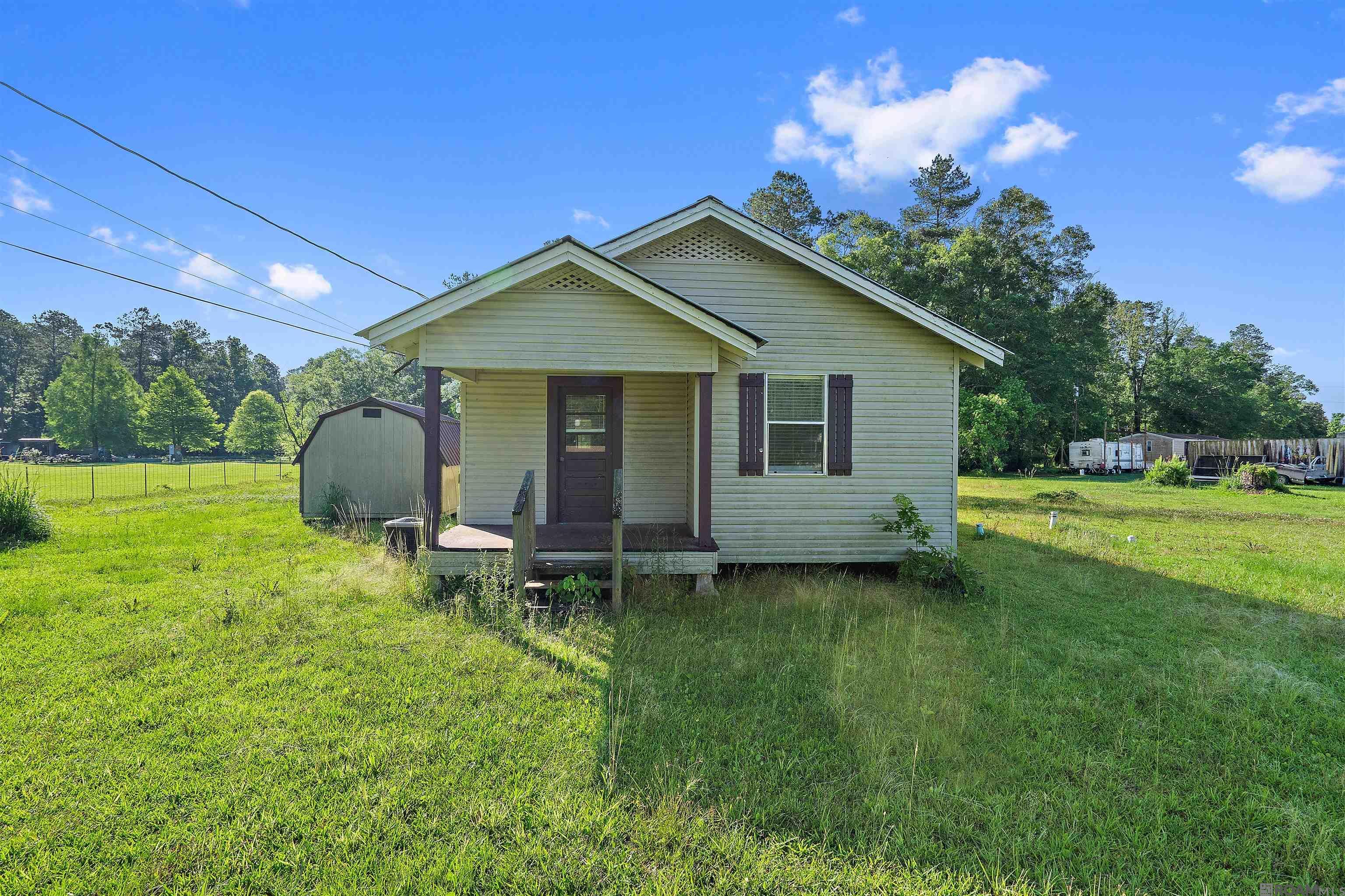 Property Photo:  23062 La Hwy 22  LA 70449 