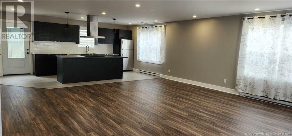 Property Photo: 202 Churchill Street NB E1C 7J9