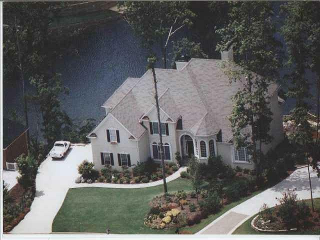 Property Photo: 9115 Nesbit Lakes Drive GA 30022