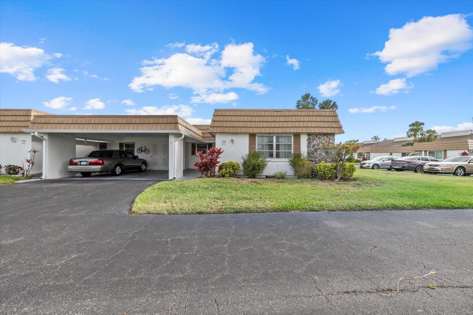 Property Photo:  2749 Riverbluff Place V65  FL 34231