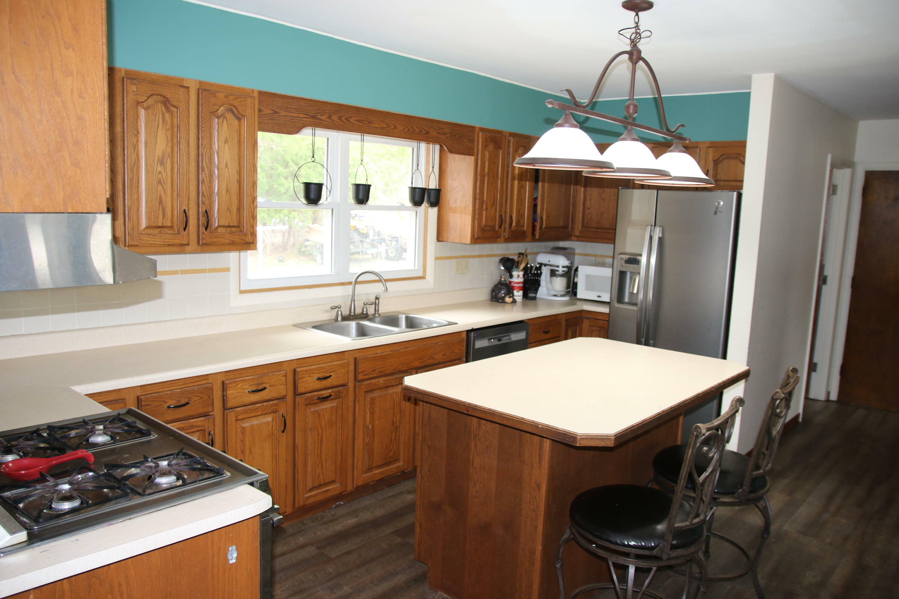 Property Photo:  567 Long Rapids Road  MI 49707 