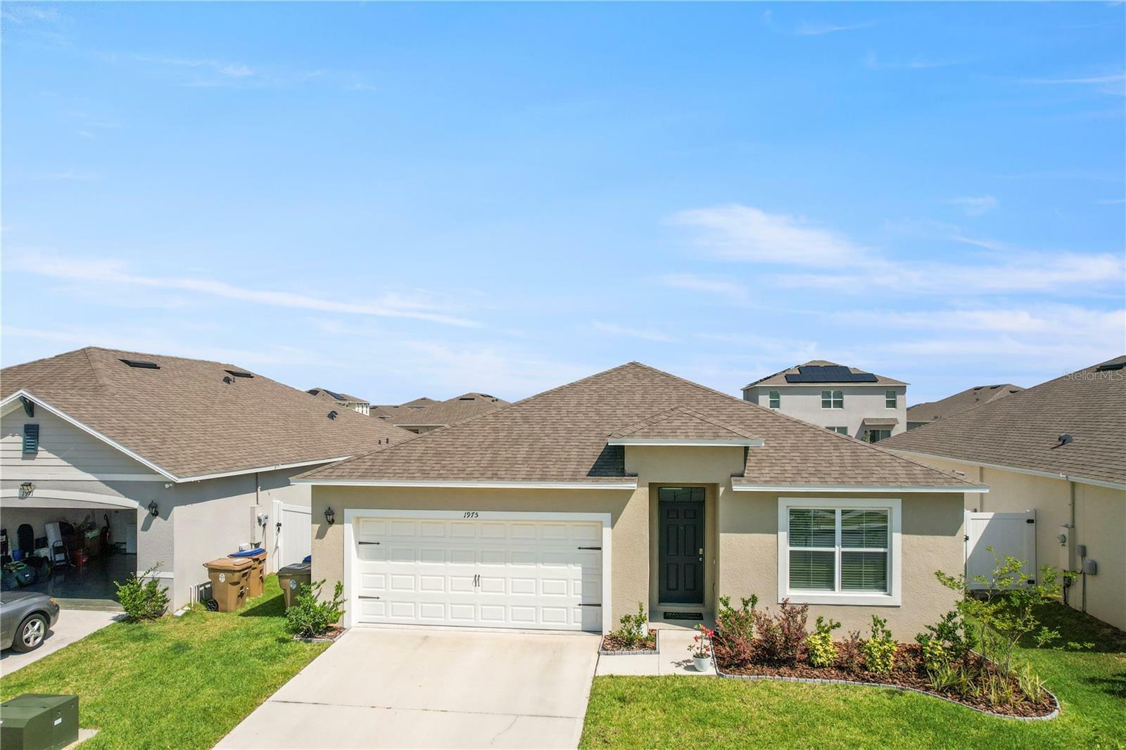 Property Photo: 1975 Cacutta Way FL 34744