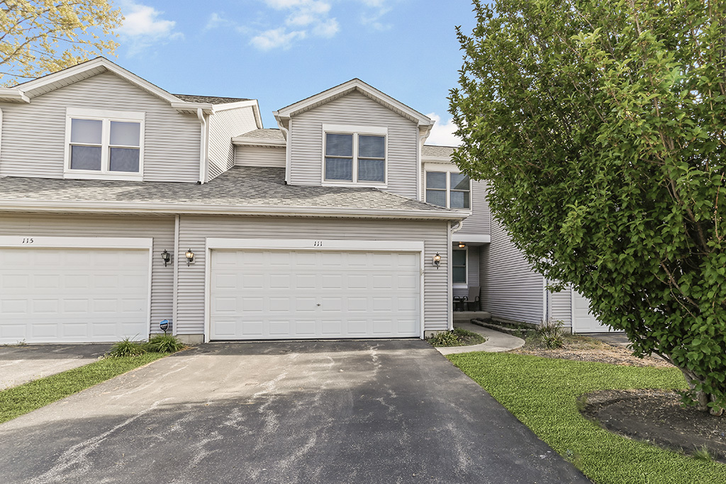 Property Photo: 111 Woodland Circle IL 60542