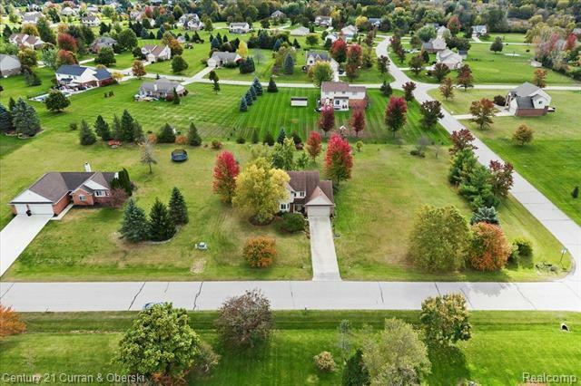 Property Photo: 9009 N Pheasant Ridge Lane MI 48176