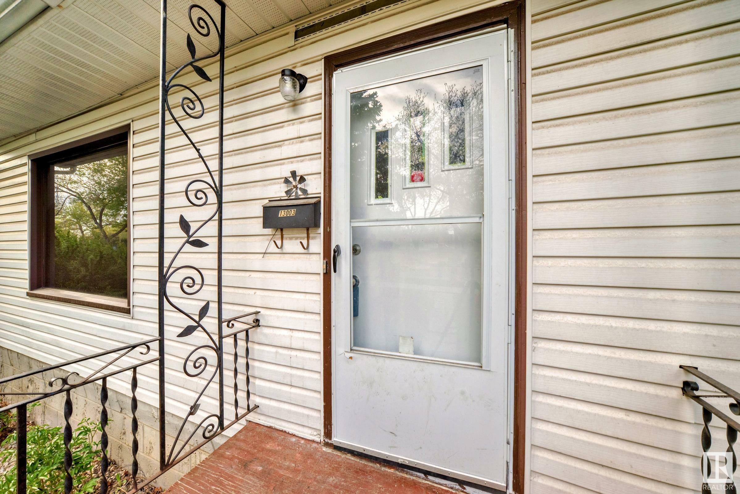 Property Photo: 13003 Sherbrooke Avenue NW AB T5L 4E6