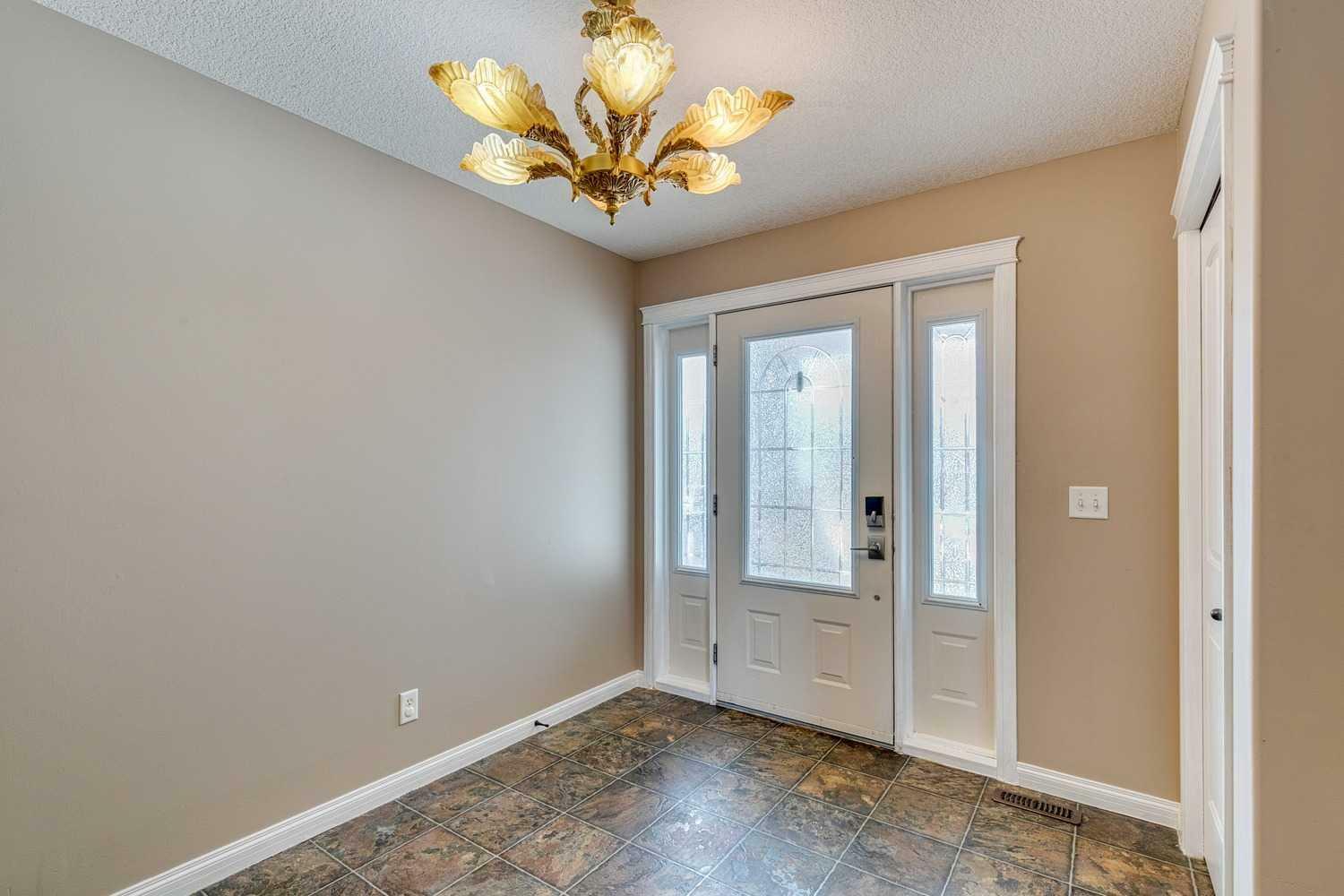 Property Photo: 1006 Highland Green Drive NW AB T1V 1V8