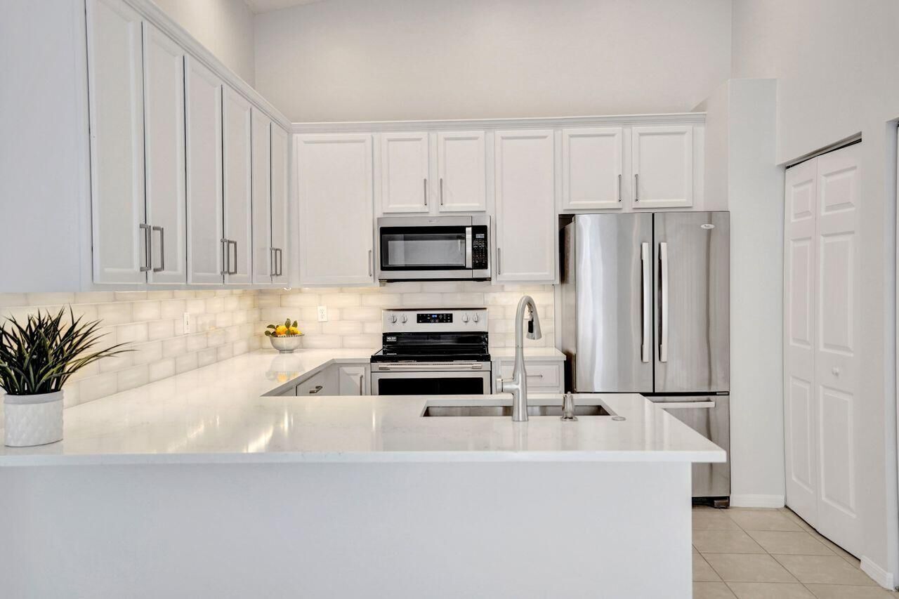 Property Photo:  5069 Toscana Trail  FL 33437 