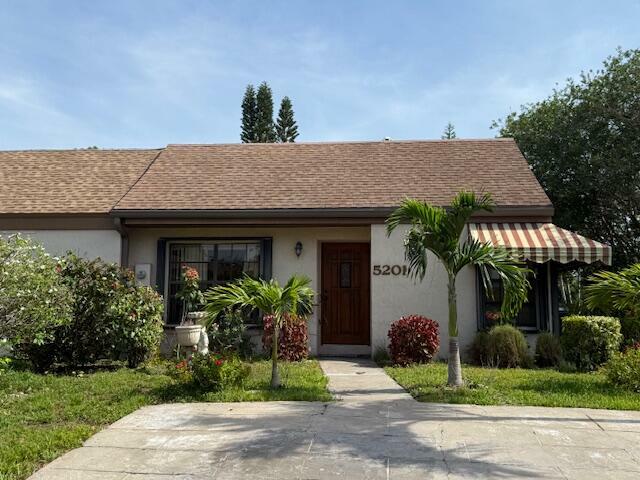 Property Photo: 5201 Spice Drive FL 33418