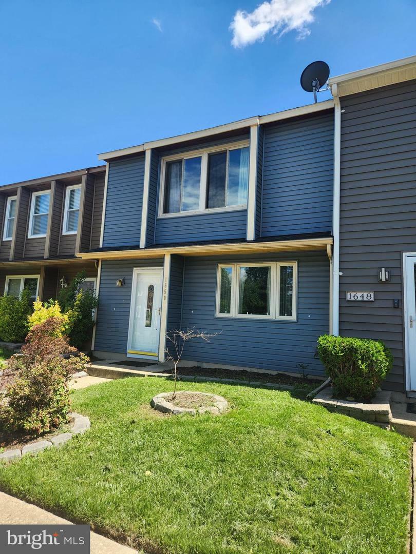 Property Photo: 1650 Woodtree Ct E MD 21409