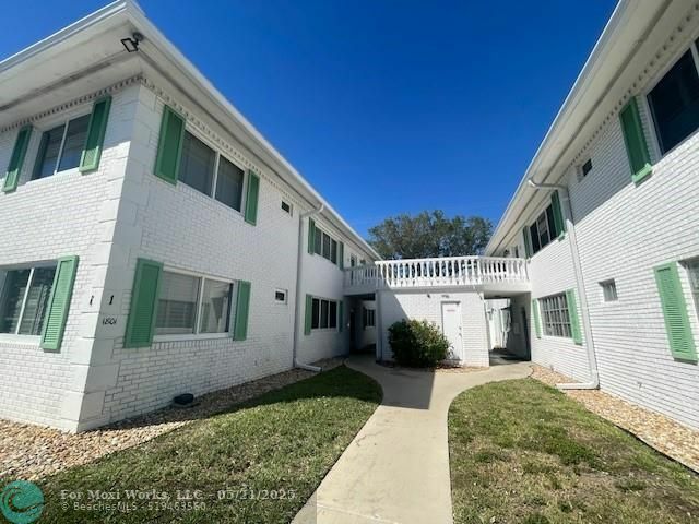 Property Photo:  1801 NE 62nd St 127  FL 33308 