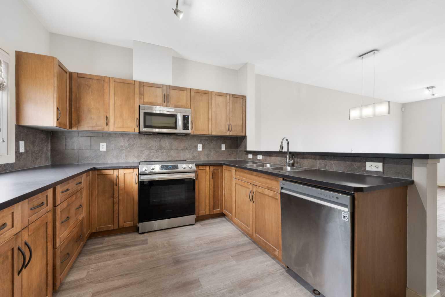 Property Photo: 281 Cougar Ridge Drive SW 1403 AB T3H 0J4