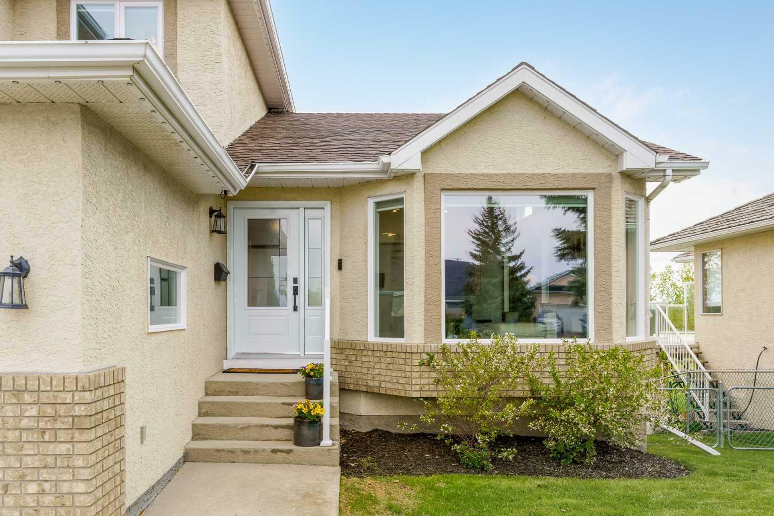 Property Photo: 220 Lakeside Greens Drive AB T1X 1C5