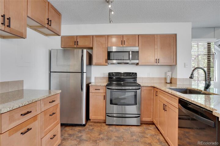 Property Photo:  4802 E Kentucky Avenue  CO 80246 