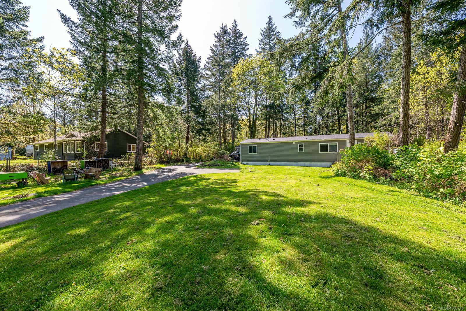 Property Photo: 5895 Bates Rd BC V9J 1W6