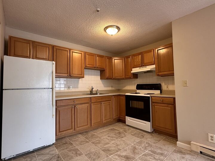 Property Photo:  71 Pond 21A  MA 02169 