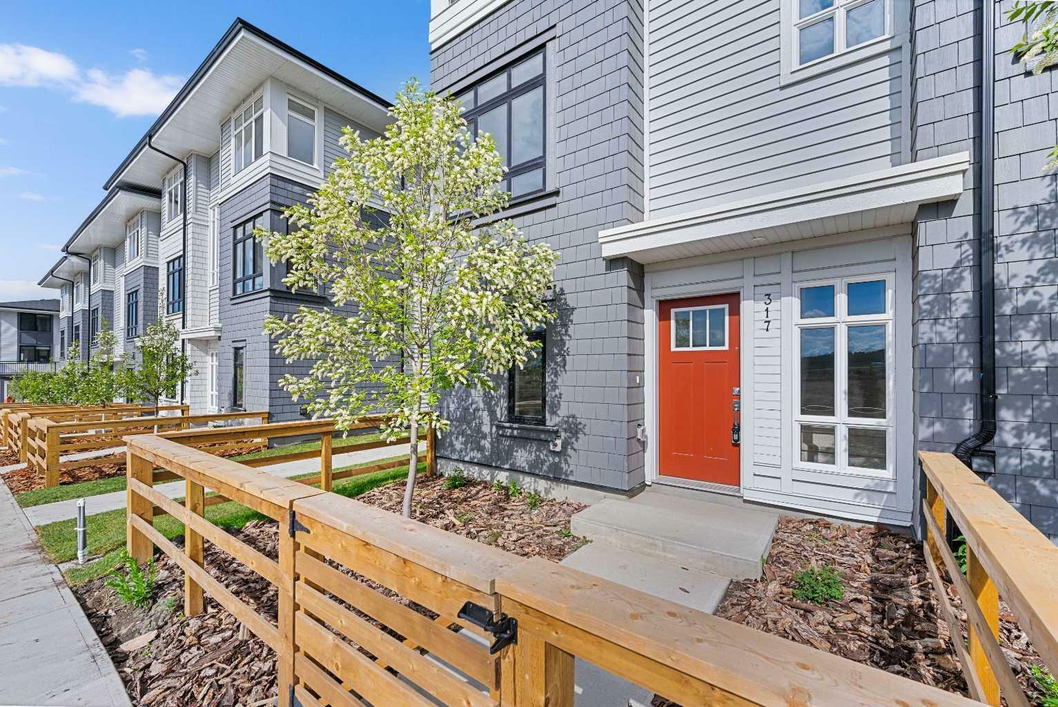 Property Photo: 857 Belmont Drive SW 317 AB T2X 4P2