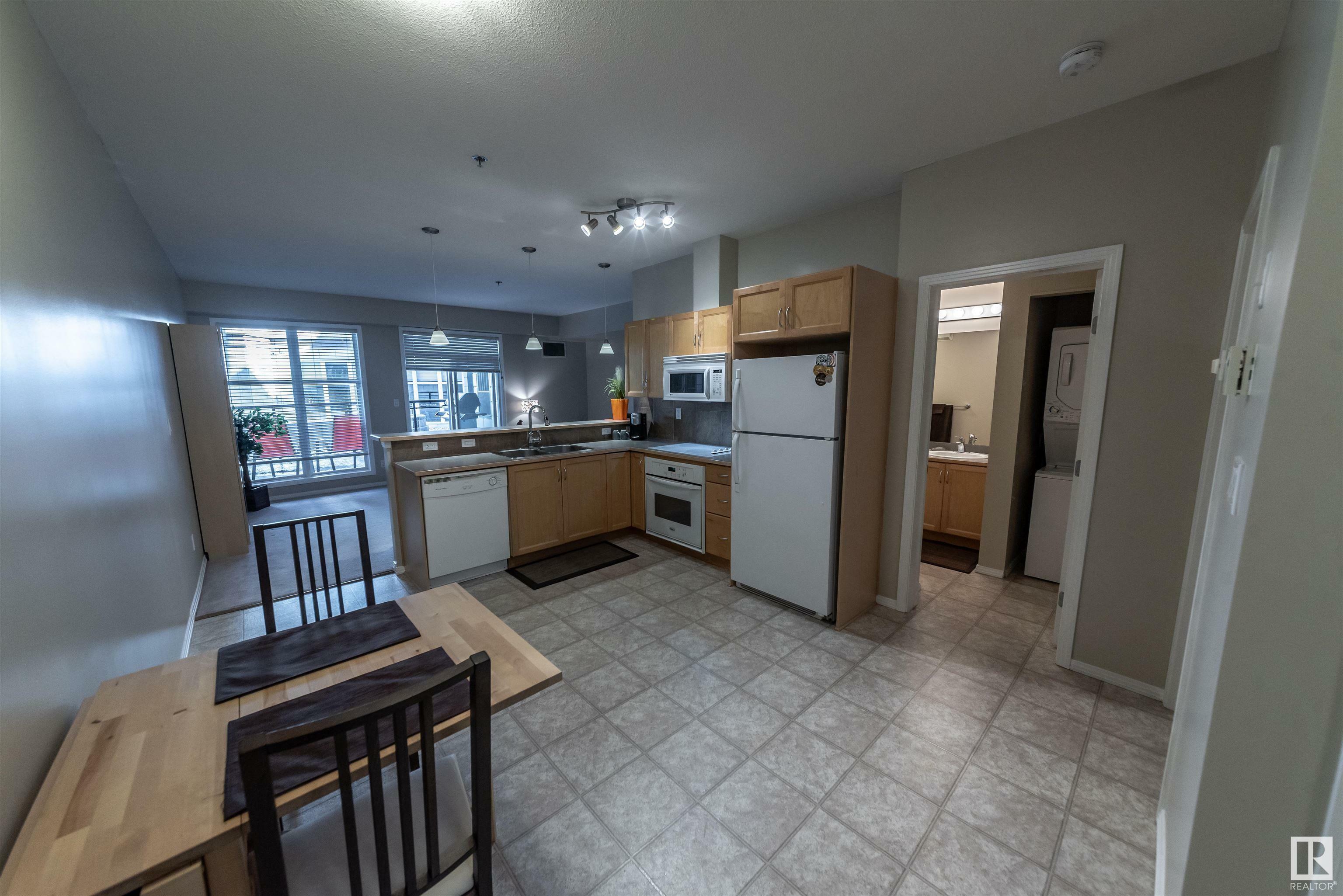 Property Photo: 4827 104A Street NW 150 AB T6H 0R5