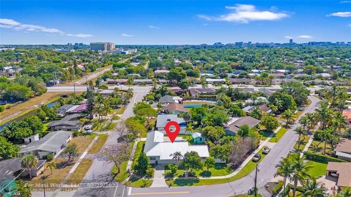 Property Photo:  698 NW 12th Rd  FL 33486 