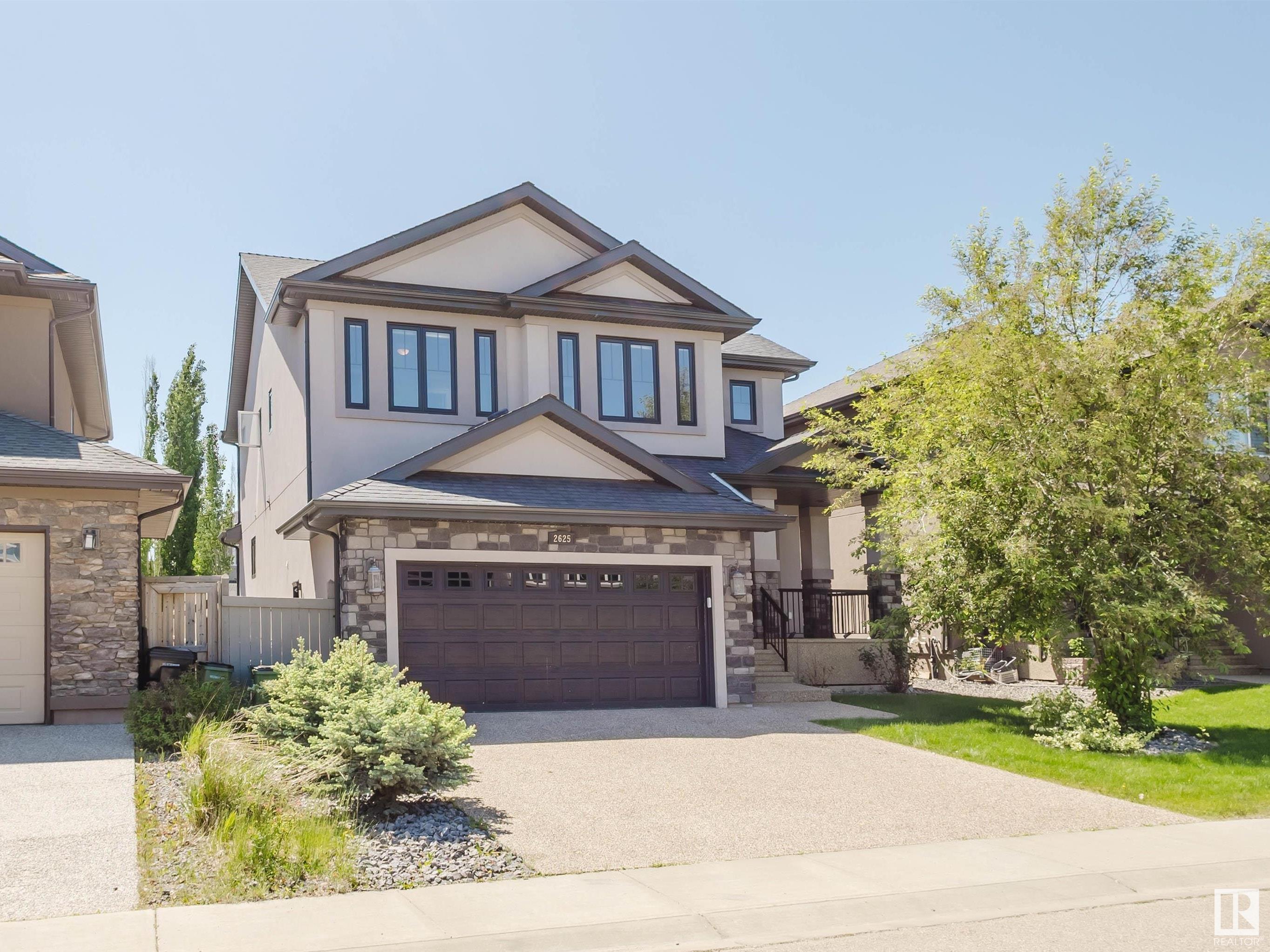 Property Photo: 2625 Watcher Way SW AB T6W 0X7