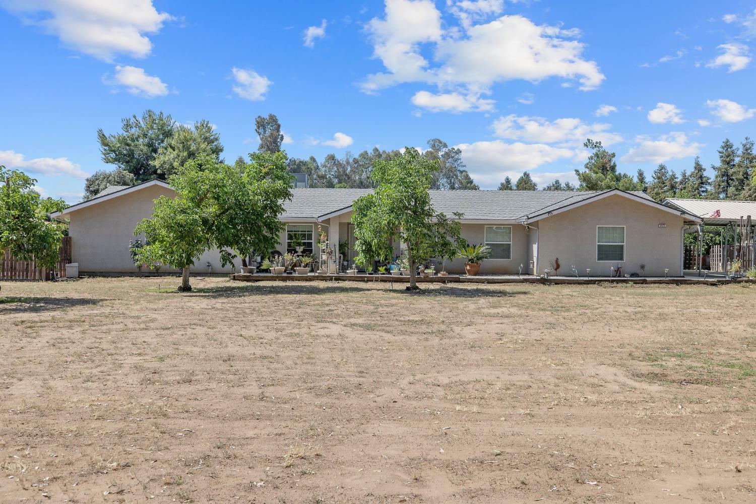 Property Photo:  8519 E Olive Avenue  CA 93737 