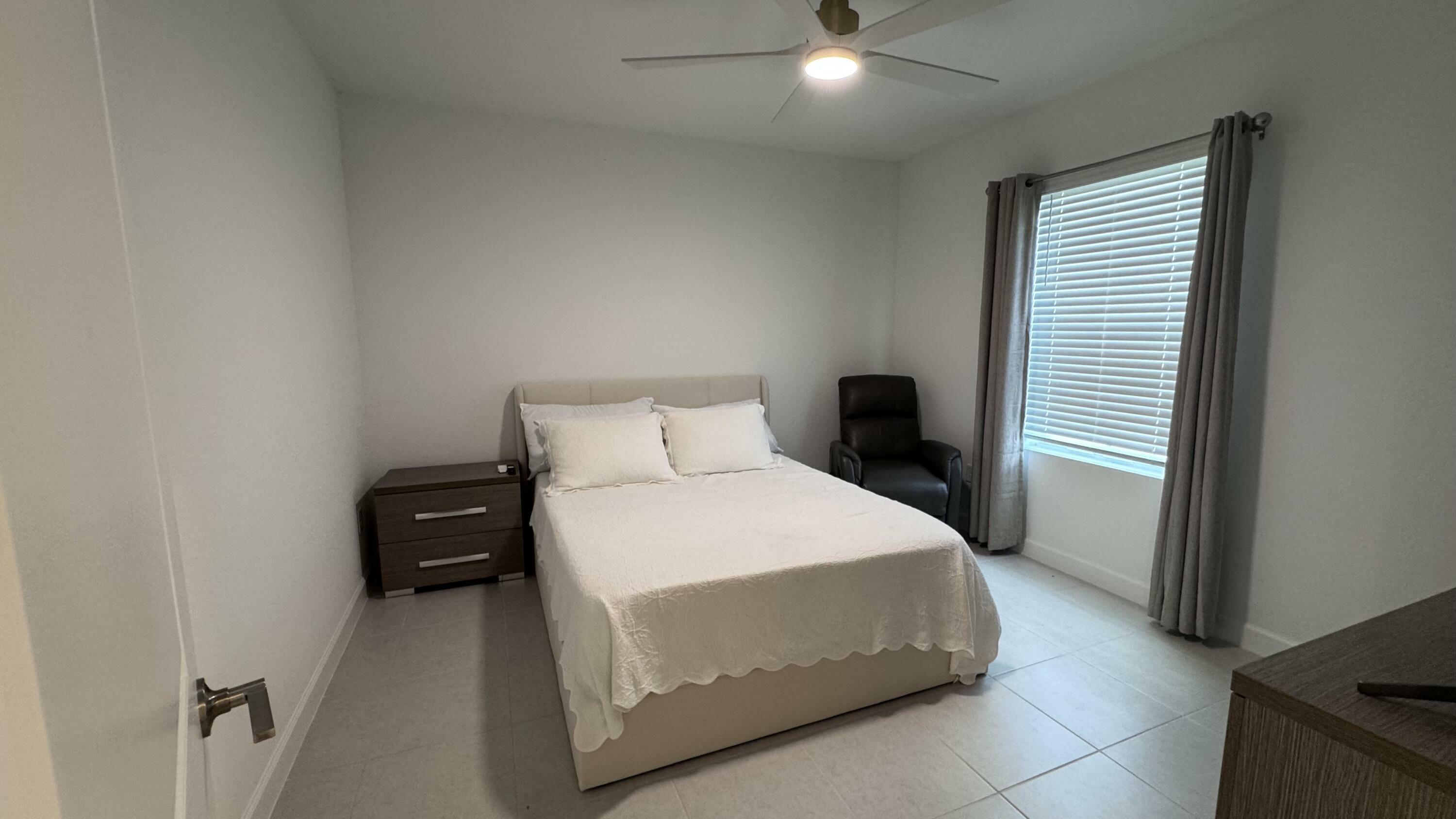 Property Photo:  6731 NW Windwood Way  FL 34987 