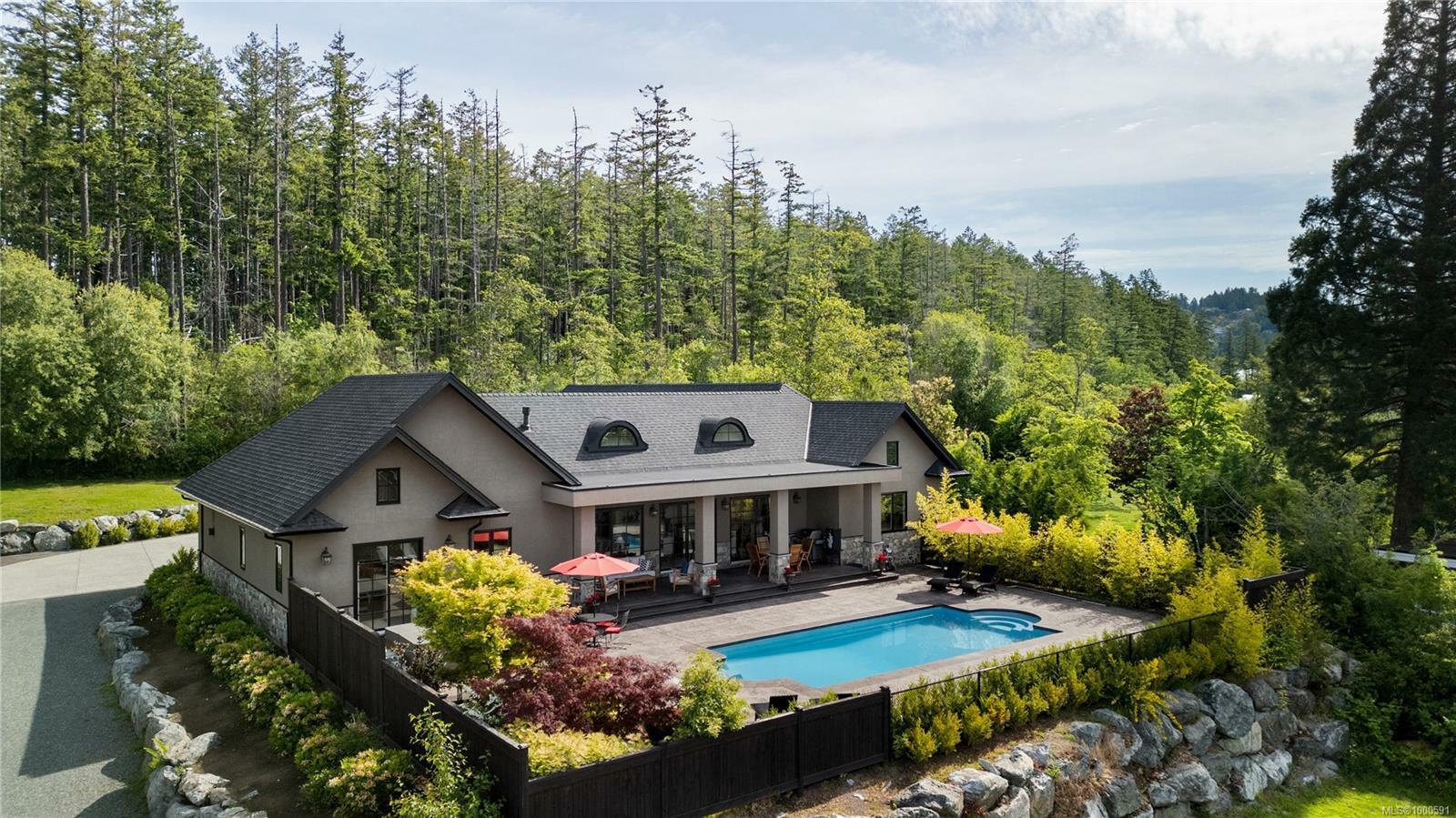 Property Photo: 11325 Chalet Rd BC V8L 5M1
