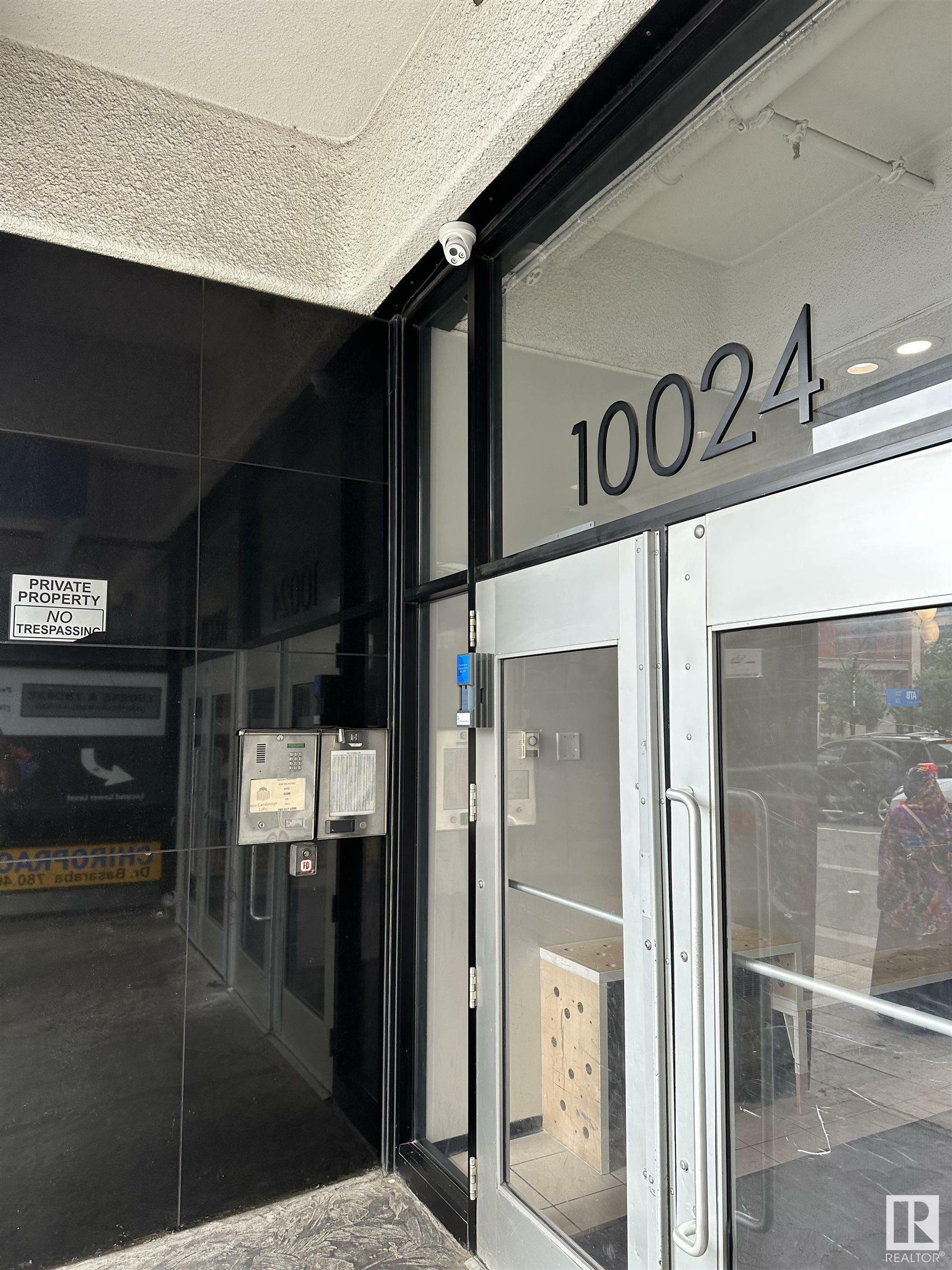 Property Photo: 10024 Jasper Ave NW NW 1012 AB T5X 4R7