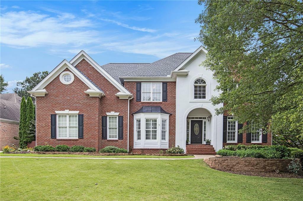 Property Photo: 650 Garden Wilde Place GA 30075