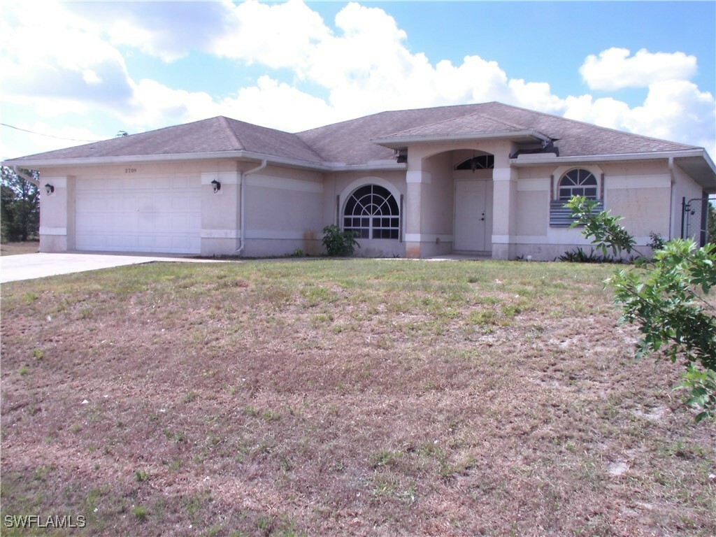 Property Photo:  2709 37th Street SW  FL 33976 