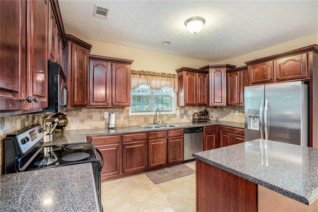 Property Photo: 7052 Camp Falls Court GA 30187