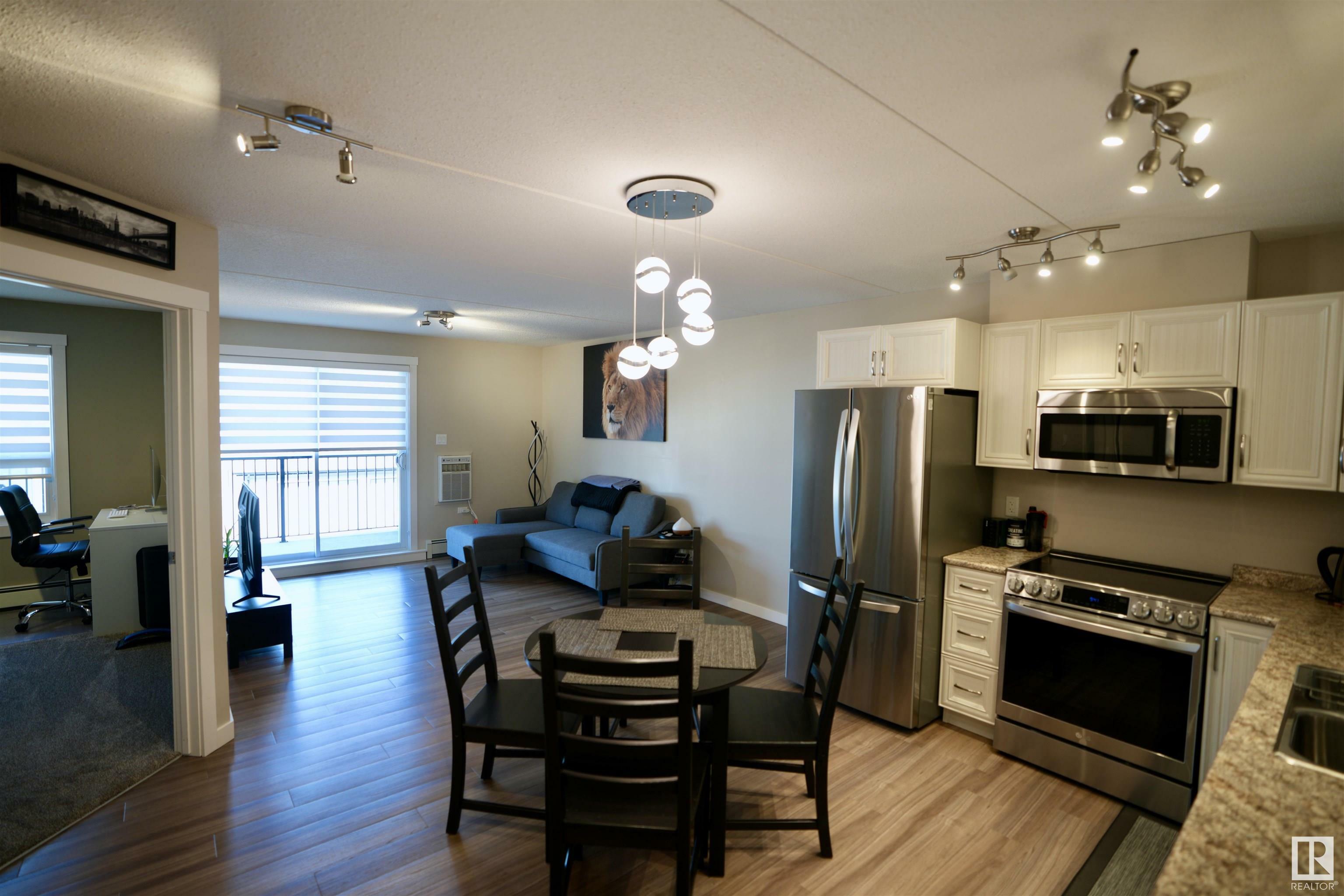 Property Photo: 4614B Lakeshore Drive 201 AB T0A 3A3