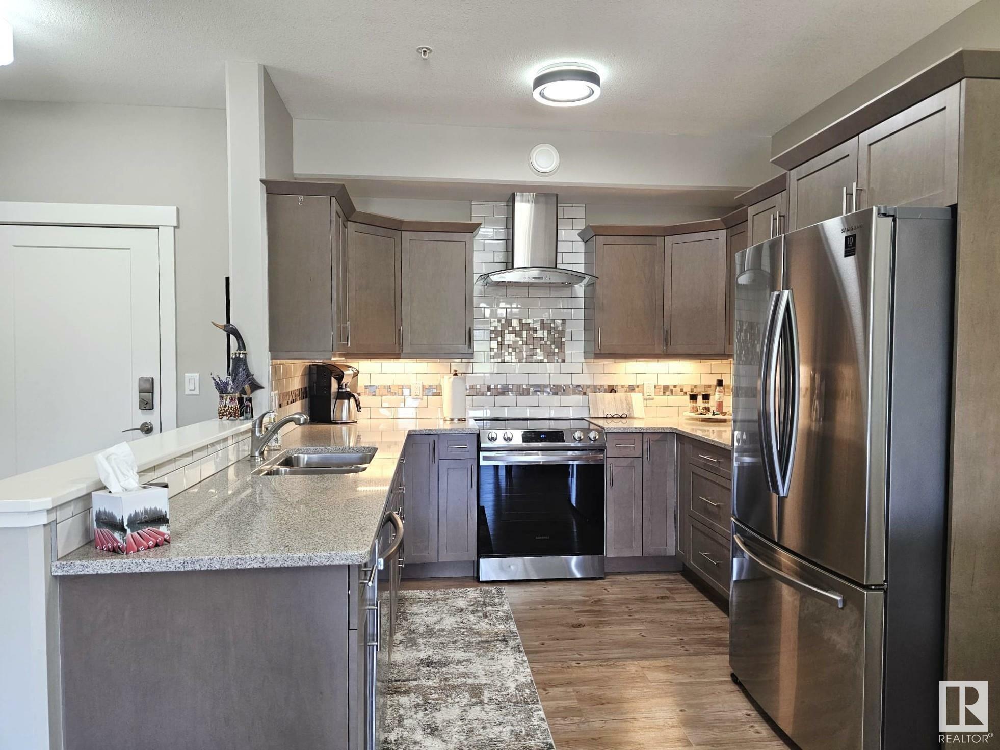 Property Photo:  5201 Brougham Drive 204  AB T7A 0C8 