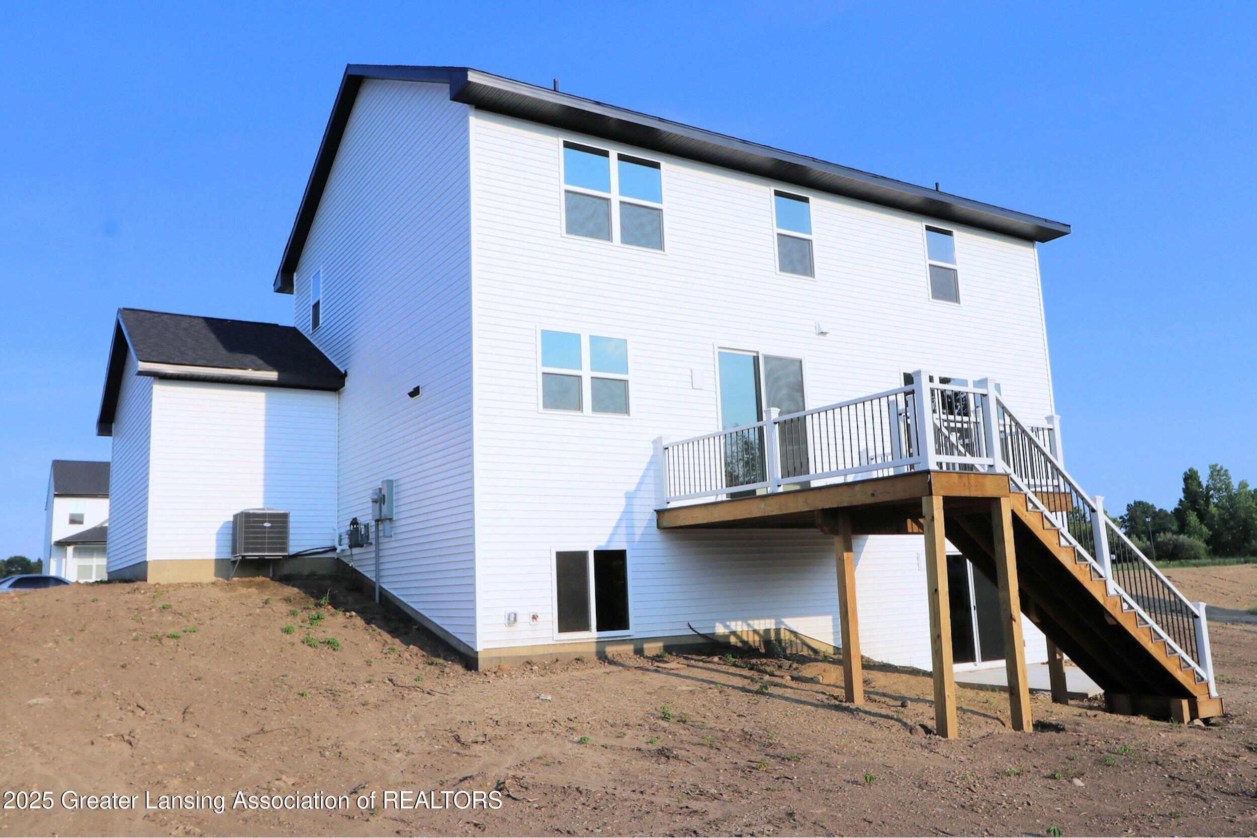 Property Photo: 606 Launch Point Drive MI 48872