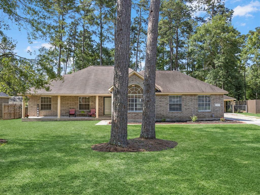 Property Photo: 2623 S Colosseum Court TX 77357