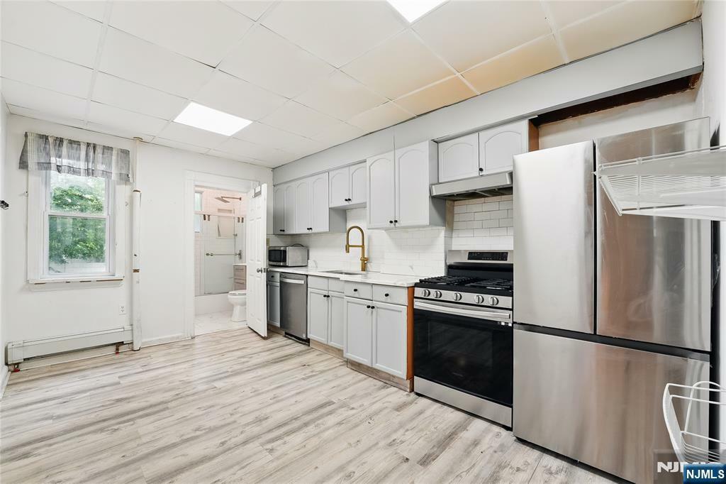 Property Photo:  26 W 51st Street  NJ 07002 