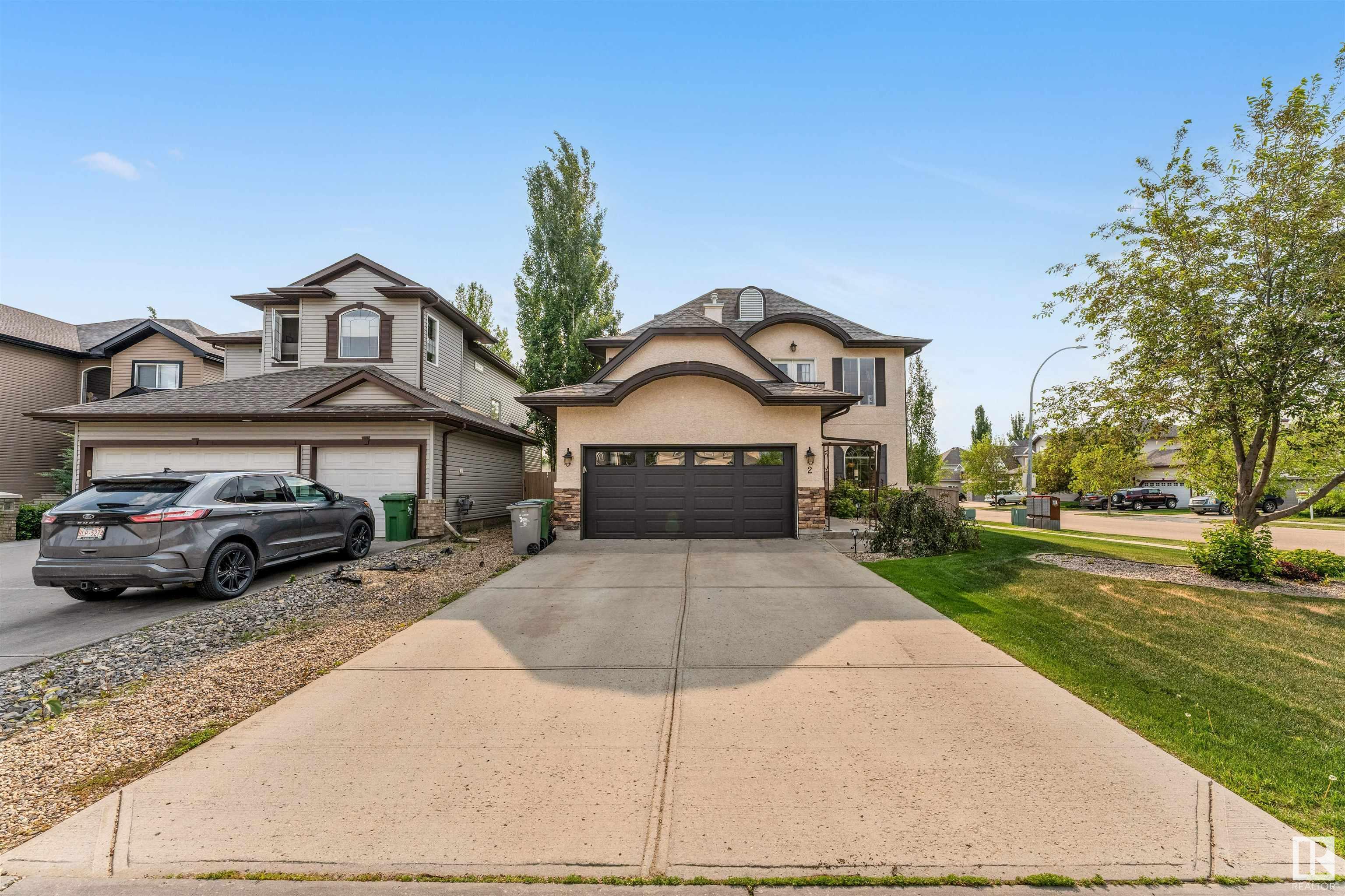 Property Photo: 2 Roche Place AB T4X 0B8